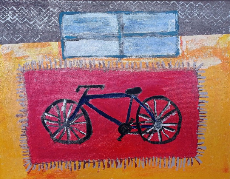 Rysunek - rower na czerwonym dywanie, w tle okno.