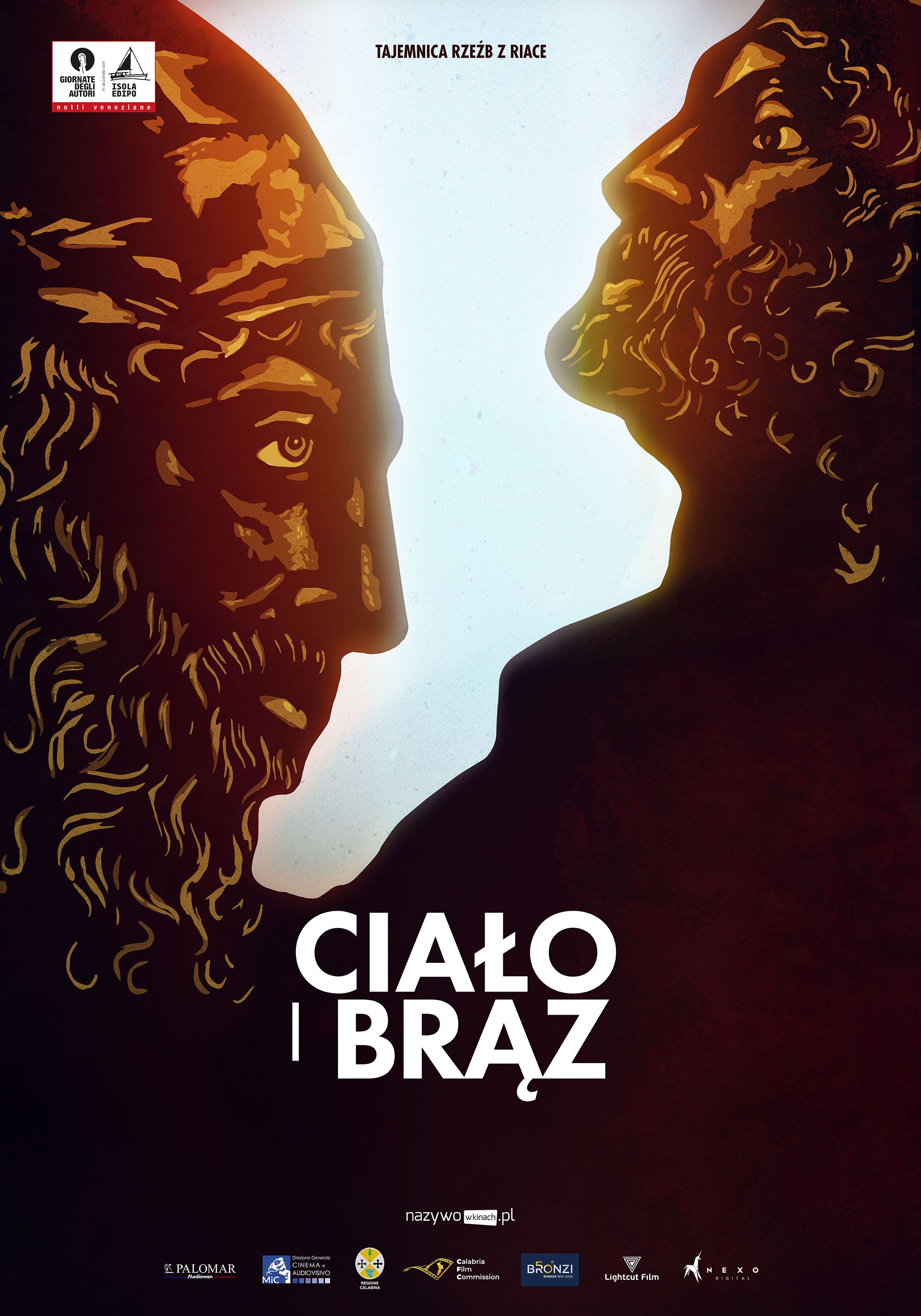 na plakacie dwie figury z brązu